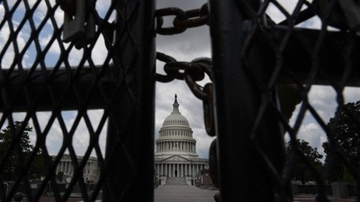 The black fence that surrounded the US Capitol building for six months following the January 6 riots has been brought back ahead of the rally along with surveillance cameras. (AFP) The black fence that surrounded the US Capitol building for six months following the January 6 riots has been brought back ahead of the rally along with surveillance cameras. (AFP)