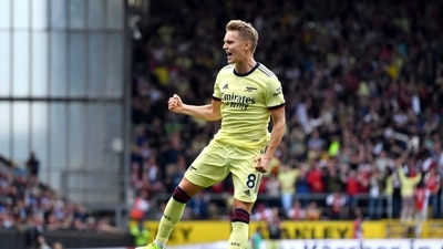 Arsenal's Martin Odegaard celebrates scoring their side's goal. (AP)