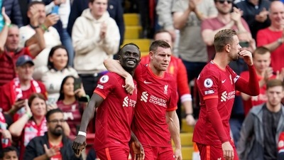 Liverpool's Sadio Mane, left, celebrates with James Milner. (AP)