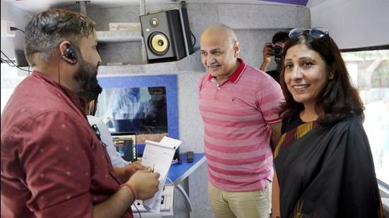 Delhi deputy chief minister Manish Sisodia inaugurates a mobile music classroom and a recording studio at the Delhi government's School of Specialized Excellence in Performing and Visual Arts in New Delhi on Saturday. (HT)