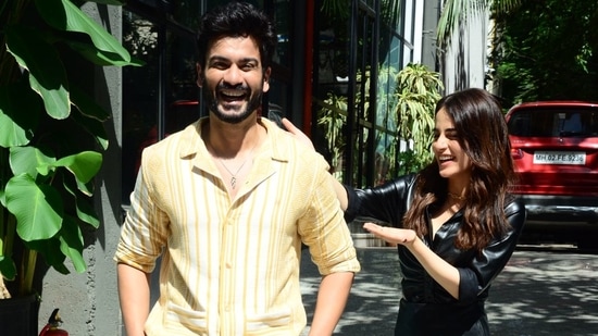 Sunny Kaushal and Radhika Madan were snapped at Maddock films office in Santa Cruz. She wore a black leather shirt paired with a matching skirt. Sunny sported a striped yellow shirt and white pants. (Varinder Chawla)
