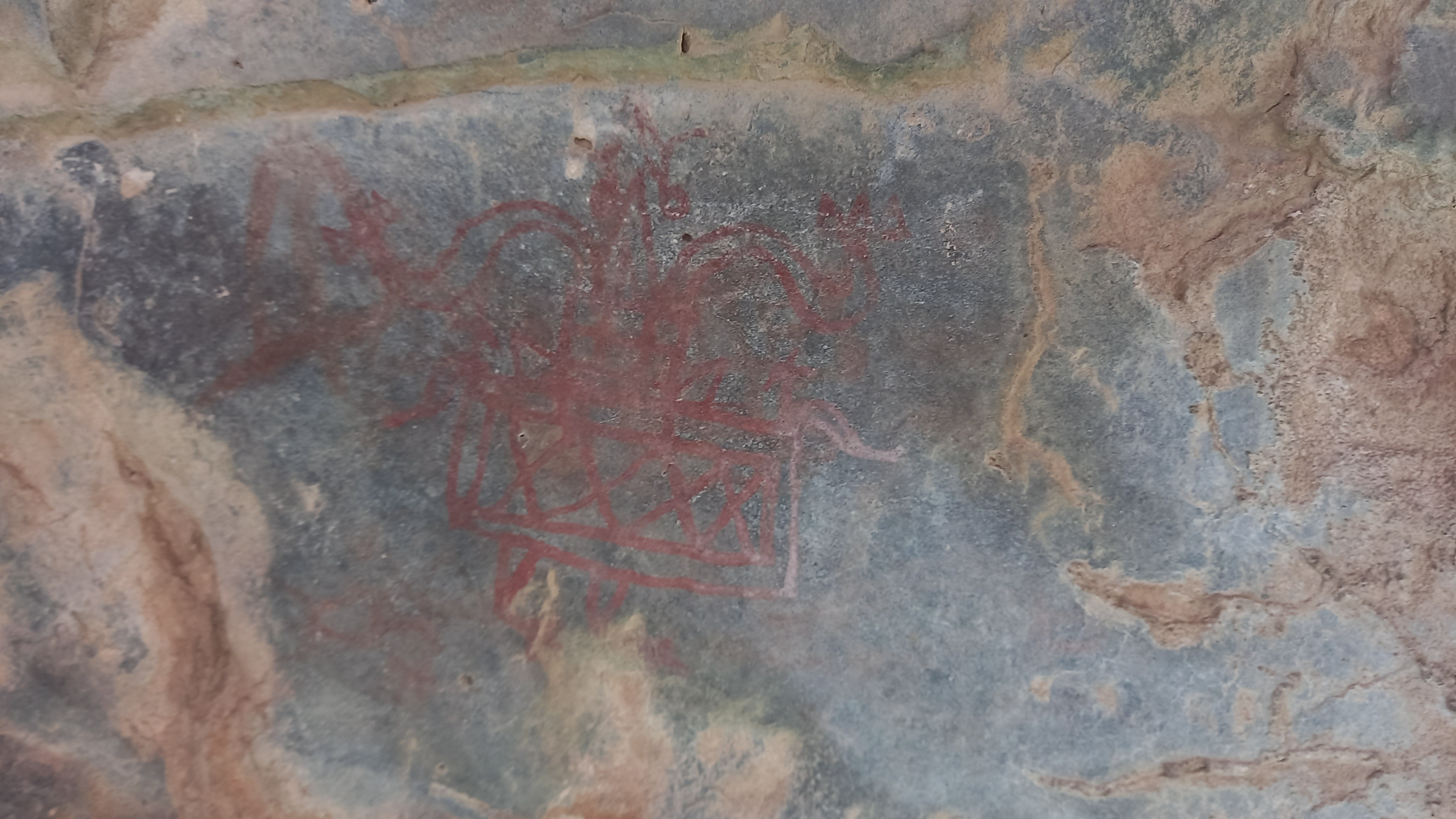 A rock painting in the Mangar Bani forest on the edge of the Aravallis. These paintings are yet to be dated and interpreted, but are signs that early man lived near Delhi. (Sunil Harsana) A rock painting in the Mangar Bani forest on the edge of the Aravallis. These paintings are yet to be dated and interpreted, but are signs that early man lived near Delhi. (Sunil Harsana)
