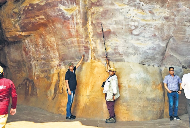 Geologists in the Auditorium Cave at Bhimbetka, where the 550-million-year-old fossils were found. They are the first of their kind found in India. (Gregory Retallack) Geologists in the Auditorium Cave at Bhimbetka, where the 550-million-year-old fossils were found. They are the first of their kind found in India. (Gregory Retallack)