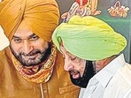 Former Punjab CM Captain Amarinder Singh (right) and Navjot Singh Sidhu (File Photo/PTI)