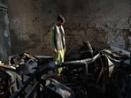 A neighbour of Ezmarai Ahmadi stands amid the debris of the house that was damaged in a US drone strike in the Kwaja Burga neighbourhood of Kabul on September 18, 2021. (AFP) A neighbour of Ezmarai Ahmadi stands amid the debris of the house that was damaged in a US drone strike in the Kwaja Burga neighbourhood of Kabul on September 18, 2021. (AFP)