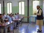Boys attend their class at Istiklal school in Kabul. Boys attend their class at Istiklal school in Kabul. 