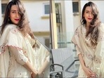 Karisma Kapoor looks angelic in  <span class='webrupee'>₹</span>22.5k ivory Anarkali set, bold red lips