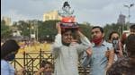 As per BMC regulations, not more than ten people are allowed at the time of immersion of public Ganesh idols, and not more than five people are allowed at the time of immersion of household Ganesh idols in Mumbai this year. (Anshuman Poyrekar/HT PHOTO) As per BMC regulations, not more than ten people are allowed at the time of immersion of public Ganesh idols, and not more than five people are allowed at the time of immersion of household Ganesh idols in Mumbai this year. (Anshuman Poyrekar/HT PHOTO)