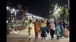 Locals take a stroll on the revamped Chandni Chowk in New Delhi on Saturday (Arvind Yadav/HT PHOTO)