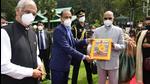 Himachal chief minister Jai Ram Thakur presenting a souvenir to President Ram Nath Kovind as governor Rajendra Vishwanath Arlekar looks on at Annadale helipad in Shimla on Sunday. (Deepak Sansta/HT) Himachal chief minister Jai Ram Thakur presenting a souvenir to President Ram Nath Kovind as governor Rajendra Vishwanath Arlekar looks on at Annadale helipad in Shimla on Sunday. (Deepak Sansta/HT)