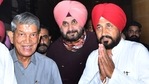 Former Uttarakhand CM and senior Congress leader Harish Rawat, PPCC President Navjot Singh Sidhu and Punjab chief minister Charanjit Singh Channi at Sector 35, in Chandigarh, on Sunday. (Photo by Keshav Singh /Hindustan Times) Former Uttarakhand CM and senior Congress leader Harish Rawat, PPCC President Navjot Singh Sidhu and Punjab chief minister Charanjit Singh Channi at Sector 35, in Chandigarh, on Sunday. (Photo by Keshav Singh /Hindustan Times)