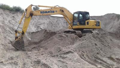 Punjab Police also recovered eight vehicles, including five tractor-trailers and tippers loaded with sand and three earthmoving machines, during the raid at Sherpur Taiba village in Moga. (HT Photo)