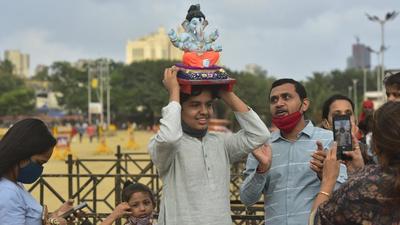 As per BMC regulations, not more than ten people are allowed at the time of immersion of public Ganesh idols, and not more than five people are allowed at the time of immersion of household Ganesh idols in Mumbai this year. (Anshuman Poyrekar/HT PHOTO) As per BMC regulations, not more than ten people are allowed at the time of immersion of public Ganesh idols, and not more than five people are allowed at the time of immersion of household Ganesh idols in Mumbai this year. (Anshuman Poyrekar/HT PHOTO)
