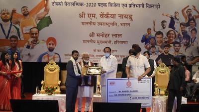 Naidu, calling upon youngsters to make physical fitness and sports a way of life, distributed prize money of ₹27 crore among 19 Paralympian medallists and participants. Chief minister Manohar Lal Khattar was also present with Naidu at the event. (Parveen Kumar/HT Photo) Naidu, calling upon youngsters to make physical fitness and sports a way of life, distributed prize money of ₹27 crore among 19 Paralympian medallists and participants. Chief minister Manohar Lal Khattar was also present with Naidu at the event. (Parveen Kumar/HT Photo)