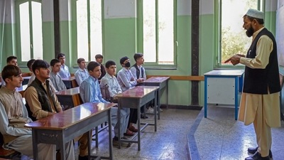 Boys attend their class at Istiklal school in Kabul. (AFP Photo) Boys attend their class at Istiklal school in Kabul. (AFP Photo)