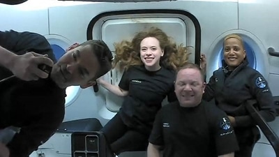 This file photo, taken on September 16, 2021, courtesy of Inspiration4, shows the Inspiration4 crew (L-R) Jared Isaacman, Hayley Arceneaux, Christopher Sembroski, and Sian Proctor in orbit. (File Photo / AFP) This file photo, taken on September 16, 2021, courtesy of Inspiration4, shows the Inspiration4 crew (L-R) Jared Isaacman, Hayley Arceneaux, Christopher Sembroski, and Sian Proctor in orbit. (File Photo / AFP)