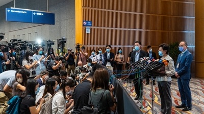 Carrie Lam, Hong Kong's chief executive, speaks to the members of the media at a polling station during the Election Committee Subsector Ordinary Elections in Hong Kong, China, on Sunday, Sept. 19, 2021. (Bloomberg) Carrie Lam, Hong Kong's chief executive, speaks to the members of the media at a polling station during the Election Committee Subsector Ordinary Elections in Hong Kong, China, on Sunday, Sept. 19, 2021. (Bloomberg)