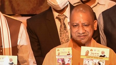 Uttar Pradesh CM Yogi Adityanath releases a book on completing 4.5 years of his government at Lok Bhawan in Lucknow (PTI Photo) Uttar Pradesh CM Yogi Adityanath releases a book on completing 4.5 years of his government at Lok Bhawan in Lucknow (PTI Photo)