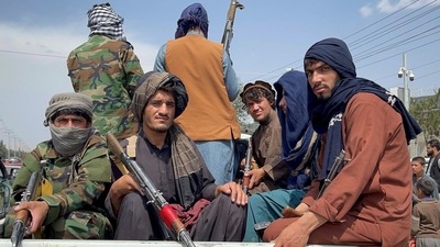 Taliban forces patrol near the entrance gate of Hamid Karzai International Airport in Kabul, Afghanistan.&nbsp; (File Photo / REUTERS)