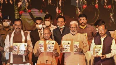 Uttar Pradesh chief minister Yogi Adityanath releases a book on completing 4.5 years of his government at Lok Bhawan in Lucknow on Sunday. (PTI) Uttar Pradesh chief minister Yogi Adityanath releases a book on completing 4.5 years of his government at Lok Bhawan in Lucknow on Sunday. (PTI)