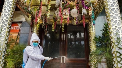 Seating arrangement for guests should be done maintaining a distance of two yards at the venue. In picture - A health worker in PPE sprays disinfectants a banquet hall. (PTI) Seating arrangement for guests should be done maintaining a distance of two yards at the venue. In picture - A health worker in PPE sprays disinfectants a banquet hall. (PTI)