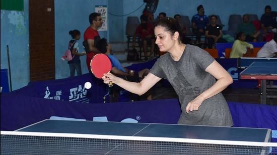 A player in action during the district table tennis championship at Shastri Badminton Hall in Ludhiana on Sunday. (Harsimar Pal Singh/HT)