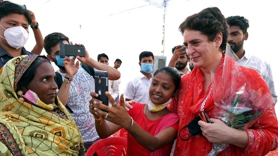 A girl takes a selfie with Priyanka Gandhi Vadra in Rae Bareli on Sunday.&nbsp;(ANI Photo)