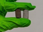 A common protein from blood plasma could act as a binder for simulated moon or Mars dust to produce a concrete-like material named AstroCrete.(University of Manchester) A common protein from blood plasma could act as a binder for simulated moon or Mars dust to produce a concrete-like material named AstroCrete.(University of Manchester)