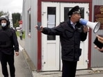 Law enforcement officers work near the scene after a gunman opened fire at the Perm State University in Perm, Russia.&nbsp;