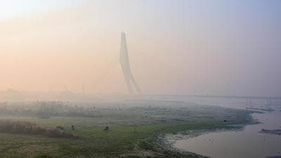 The Signature Bridge engulfed in a thick layer of haze in the morning, at Wazirabad in New Delhi in October, 2020. (HT archive) The Signature Bridge engulfed in a thick layer of haze in the morning, at Wazirabad in New Delhi in October, 2020. (HT archive)