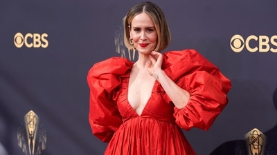 Sarah Paulson looked radiant as she arrived at the 73rd Primetime Emmy Awards in a bright red statement-making gown featuring plunging neckline, OTT sleeves and a voluminous skirt. (Chris Pizzello/Invision/AP) Sarah Paulson looked radiant as she arrived at the 73rd Primetime Emmy Awards in a bright red statement-making gown featuring plunging neckline, OTT sleeves and a voluminous skirt. (Chris Pizzello/Invision/AP)