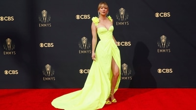 Kaley Cuoco attends the 73rd Primetime Emmy Awards in Los Angeles, California. Her show-stopping neon yellow custom Haute couture dress is by Vera Wang and features floral-embellished straps, a slit and a billowy train. (REUTERS)
