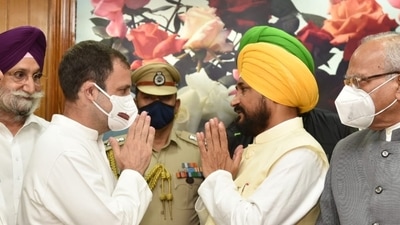 New Punjab CM Charanjit Singh Channi (right) greets Rahul Gandhi