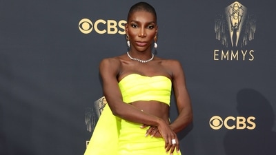 Michaela Coel, winner of Outstanding Writing for a Limited or Anthology Series or Movie for the brilliant I May Destroy You, wore a neon yellow Christopher John Rogers two-piece dress. The custom look was composed of an ankle-length column skirt in cotton twill and a neon bralette top. (AFP) Michaela Coel, winner of Outstanding Writing for a Limited or Anthology Series or Movie for the brilliant I May Destroy You, wore a neon yellow Christopher John Rogers two-piece dress. The custom look was composed of an ankle-length column skirt in cotton twill and a neon bralette top. (AFP)