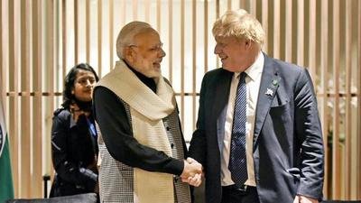 Prime Minister Narendra Modi with his Britain counterpart Boris Johnson. The latest changes in the UK government’s travel restrictions had upset the Indian side as travellers who have got both doses of the AstraZeneca vaccine would have to undergo 10 days of quarantine. Prime Minister Narendra Modi with his Britain counterpart Boris Johnson. The latest changes in the UK government’s travel restrictions had upset the Indian side as travellers who have got both doses of the AstraZeneca vaccine would have to undergo 10 days of quarantine.