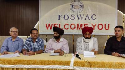 Members of the Federation of Sectors Welfare Association Chandigarh at a meeting of the body on Monday. (HT Photo)