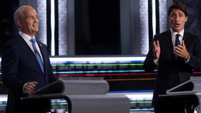 Prime Minister and Liberal leader Justin Trudeau (right) gestures to Conservative leader Erin O’Toole during the Canada elections French-language leaders debate at the Canadian Museum of History in Gatineau, Quebec. (AFP) Prime Minister and Liberal leader Justin Trudeau (right) gestures to Conservative leader Erin O’Toole during the Canada elections French-language leaders debate at the Canadian Museum of History in Gatineau, Quebec. (AFP)