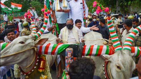 Senior Congress leader Siddaramaiah in Karnataka had arrived at the state assembly in a bullock cart in a protest against the hike in fuel and LPG prices. The Congress continued to protest by riding bicycles. (PTI) Senior Congress leader Siddaramaiah in Karnataka had arrived at the state assembly in a bullock cart in a protest against the hike in fuel and LPG prices. The Congress continued to protest by riding bicycles. (PTI)