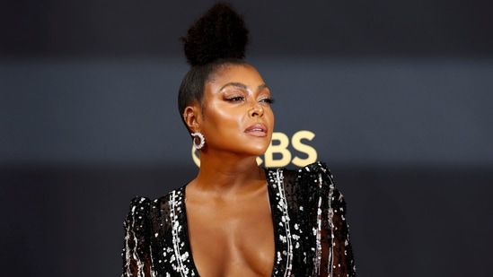 Actor Taraji P. Henson attended the 73rd Primetime Emmy Awards in Los Angeles, wearing a black sheer embellished gown featuring a plunging neckline. She wore her hair in a sleek top bun.&nbsp;(REUTERS)