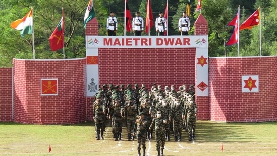 The battalions of Indian and Nepali Army march near the border between the two countries at Pithoragarh in Uttarakhand on Monday. (Twitter/ANI) The battalions of Indian and Nepali Army march near the border between the two countries at Pithoragarh in Uttarakhand on Monday. (Twitter/ANI)