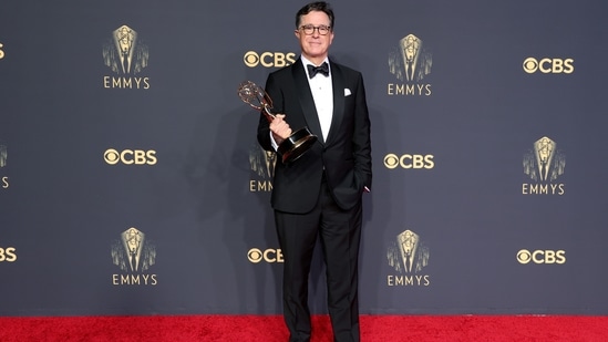 Stephen Colbert, winner of the Outstanding Variety Special (Live) award for Stephen Colbert's Election Night 2020: Democracy's Last Stand Building Back America Great Again Better 2020, poses in the press room during the 73rd Primetime Emmy Awards.(AFP)