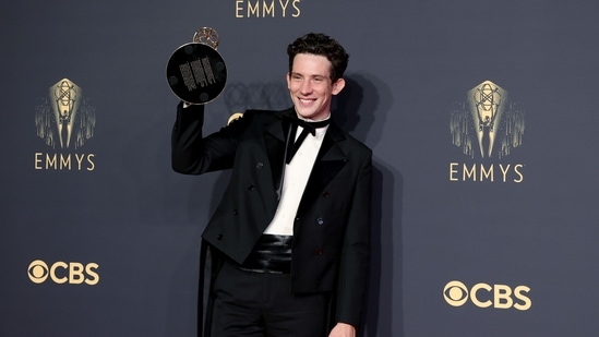 Josh O'Connor, winner of the Outstanding Lead Actor In A Drama Series award for The Crown, poses in the press room during the 73rd Primetime Emmy Awards at L.A. LIVE in Los Angeles, California. He chose a sleek black tuxedo for the awards night.&nbsp;(AFP)