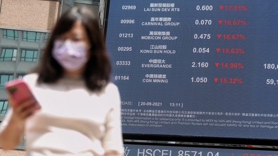 Hong Kong earlier dived 3.3 percent, spearheading Asian losses, with Evergrande widely expected to default on upcoming interest payments this week. (Kyle Lam/Bloomberg)