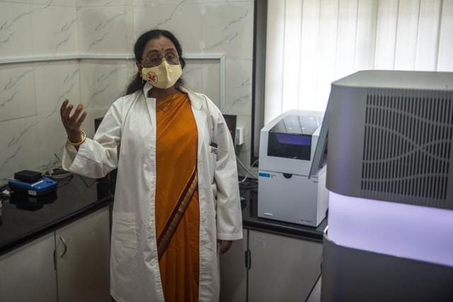 The team of three handles the samples in a transit room equipped with an exhaust system with a virus burning unit that is meant to trap and destroy the pathogen in case of a leak. (Pratik Chorge/HT PHOTO) The team of three handles the samples in a transit room equipped with an exhaust system with a virus burning unit that is meant to trap and destroy the pathogen in case of a leak. (Pratik Chorge/HT PHOTO)