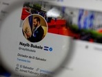 The twitter profile of El Salvador's President Nayib Bukele reading 'Dictator of El Salvador' is seen on a computer screen in this photo illustration.