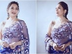 Madhuri Dixit in <span class='webrupee'>₹</span>1.8 lakh floral saree and bustier is ethereal beyond words, all pics(Instagram/@madhuridixtinene) Madhuri Dixit in <span class='webrupee'>₹</span>1.8 lakh floral saree and bustier is ethereal beyond words, all pics(Instagram/@madhuridixtinene)