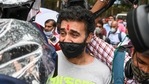 Raj Kundra leaves after being released on bail from a Mumbai jail for allegedly producing and broadcasting pornographic films online. (AFP Photo) Raj Kundra leaves after being released on bail from a Mumbai jail for allegedly producing and broadcasting pornographic films online. (AFP Photo)