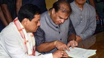 Union minister Sarbananda Sonowal files his nomination papers for the Rajya Sabha elections in the presence of Assam Chief Minister Himanta Biswa Sarma at Dispur in Guwahati. (PTI Photo) Union minister Sarbananda Sonowal files his nomination papers for the Rajya Sabha elections in the presence of Assam Chief Minister Himanta Biswa Sarma at Dispur in Guwahati. (PTI Photo)
