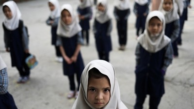 Taliban's latest announcement comes after the education ministry ordered male teachers and students back to secondary school at the weekend, but made no mention of the country's women educators and girl pupils. (via REUTERS)