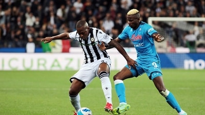 Udinese's Samir, left, and Napoli's Victor Osimhen in action during the Serie A soccer match between Udinese and Napoli, at the Dacia arena in Udine (AP)